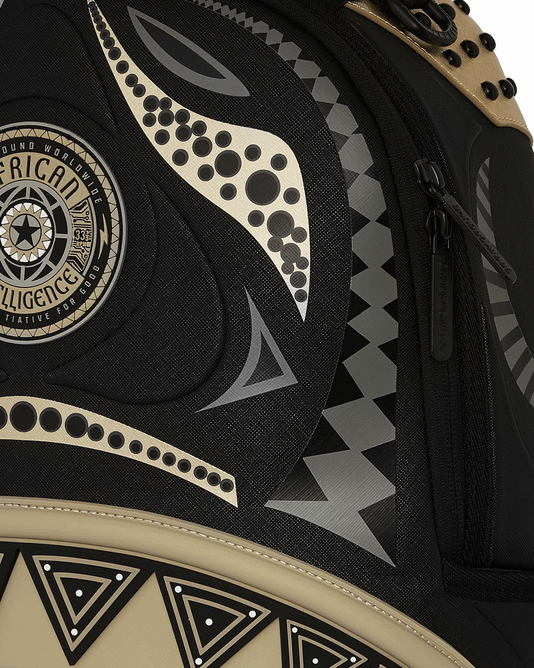 Sprayground - A.I. AFRICAN INTELLIGENCE SHARKS OF THE GOLD OCEAN BACKPACK - SANDFLOW