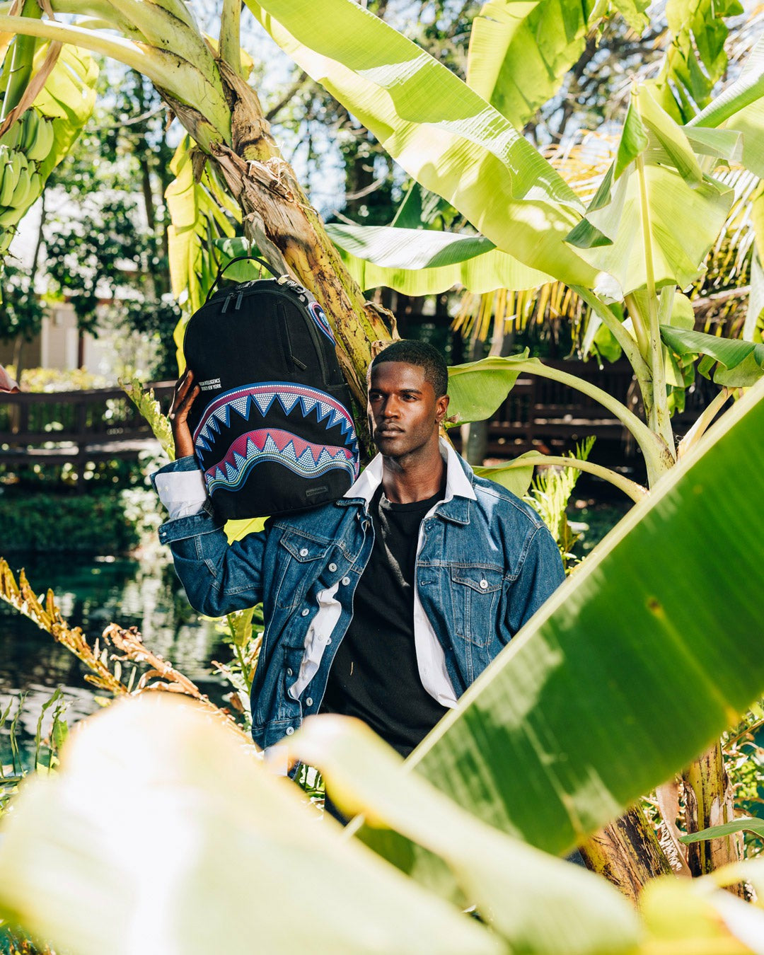 Sprayground - A.I. AFRICAN INTELLIGENCE BORN AND RAISED BACKPACK - SANDFLOWER COLLAB