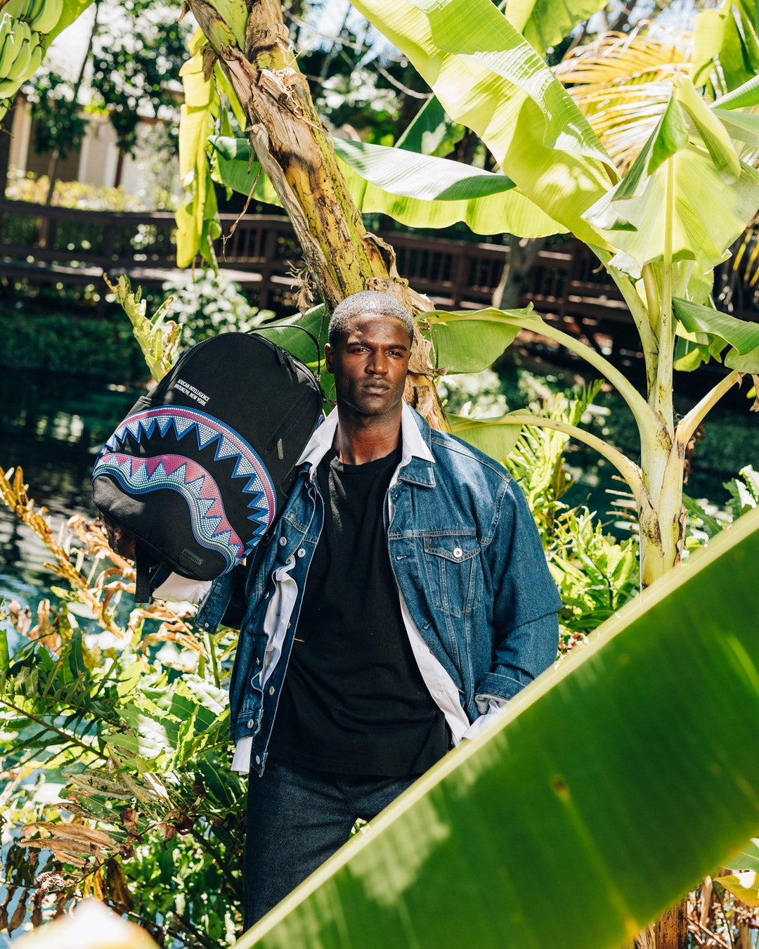 Sprayground - A.I. AFRICAN INTELLIGENCE BORN AND RAISED BACKPACK - SANDFLOWER COLLAB