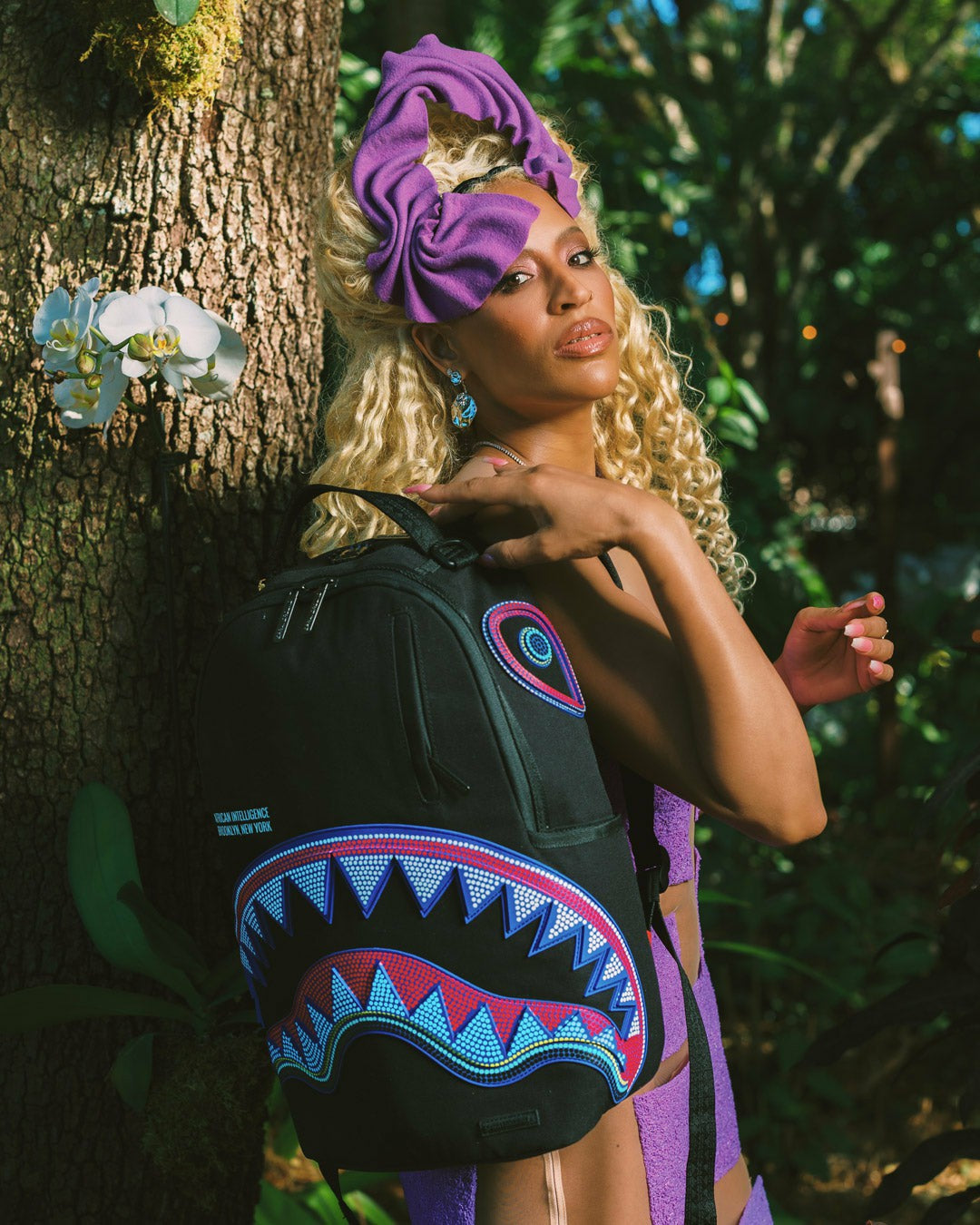 Sprayground - A.I. AFRICAN INTELLIGENCE BORN AND RAISED BACKPACK - SANDFLOWER COLLAB