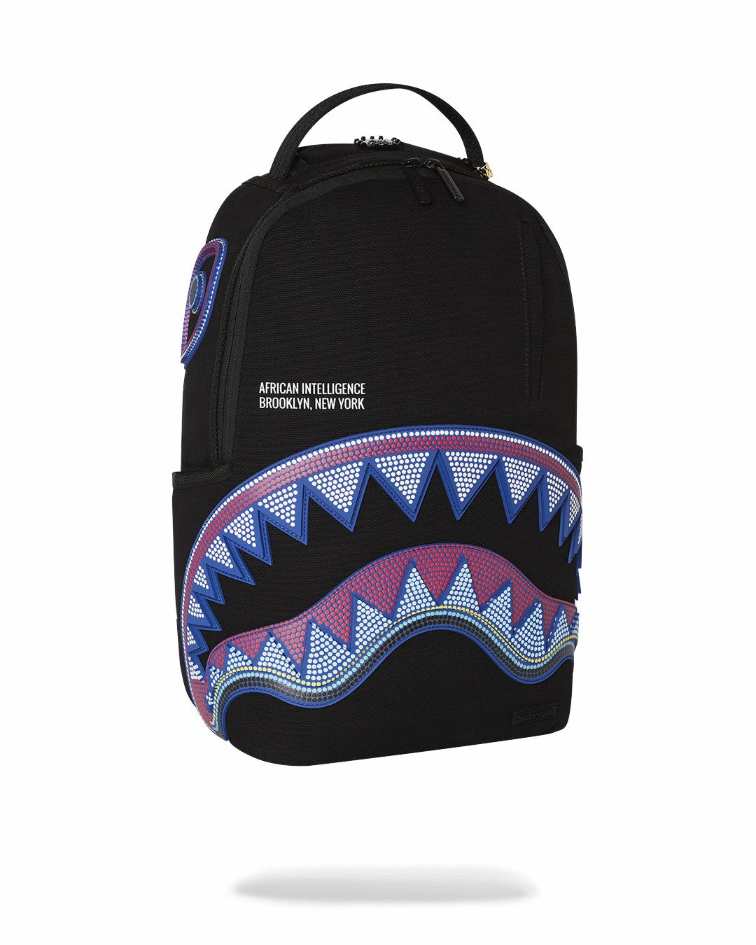 Sprayground - A.I. AFRICAN INTELLIGENCE BORN AND RAISED BACKPACK - SANDFLOWER COLLAB