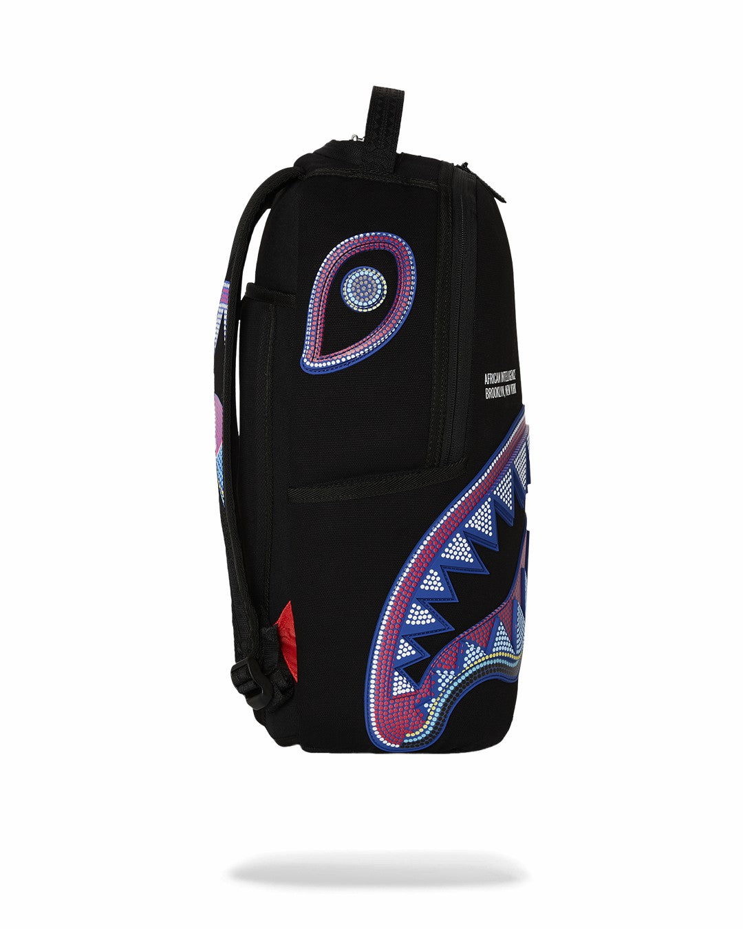 Sprayground - A.I. AFRICAN INTELLIGENCE BORN AND RAISED BACKPACK - SANDFLOWER COLLAB