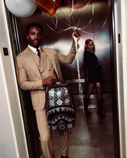 Sprayground - AFRICAN INTELLIGENCE 9 POWER GLYPHICS BACKPACK - SANDFLOWER COLLAB