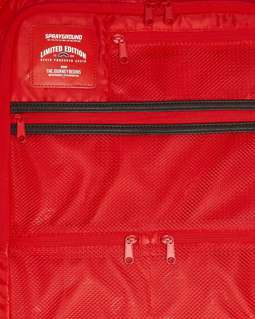 Sprayground - EXTERIOR GOLD ZIP POCKET SHARKS IN PARIS JETSETTER CARRY-ON LUGGAGE