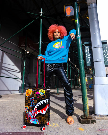 Sprayground - GLOBAL MOGUL POPAGANDA RON ENGLISH EDITION HARDSHELL CARRY-ON LUGGAGE