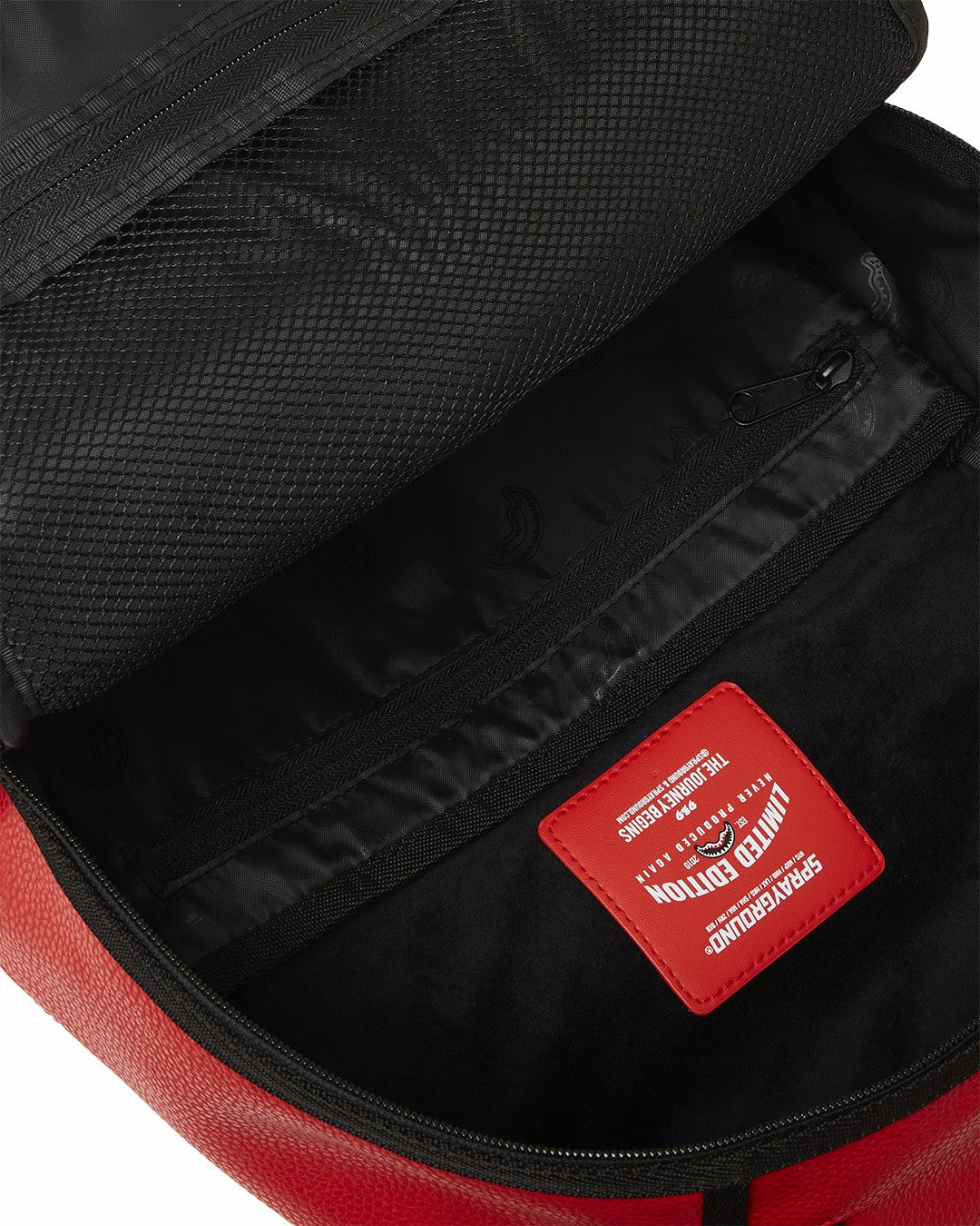 Sprayground - SHARK CENTRAL EMBOSSED DRIP DLXSV BACKPACK