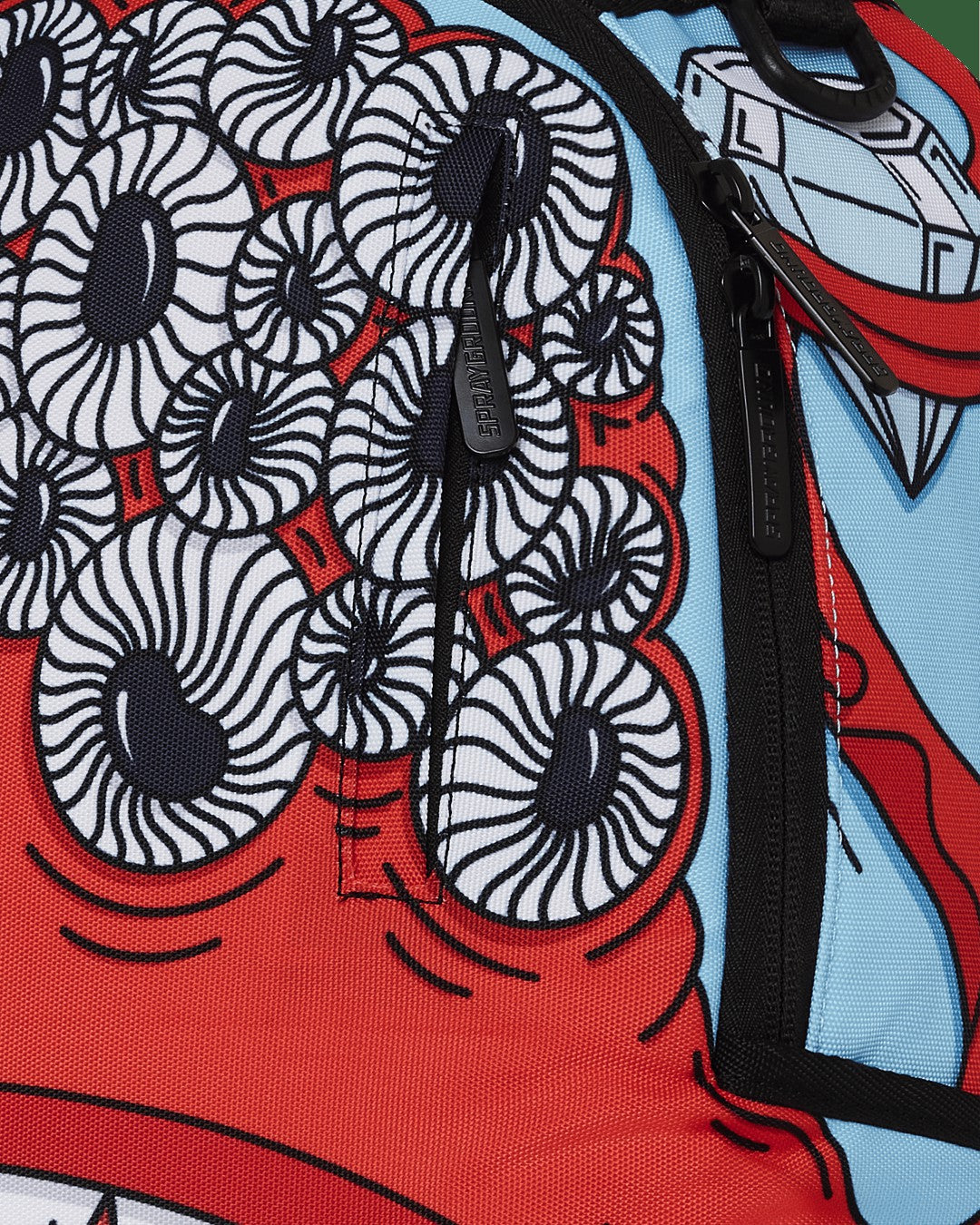 Sprayground - JORGE RODRIGUEZ THE ARTIST COLLAB BLINKY SHARK BACKPACK