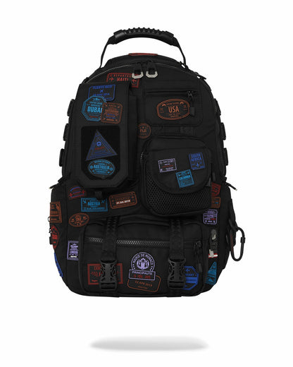 Sprayground - JAMES FIRST CLASS I GOT THESE STAMPS BACKPACK