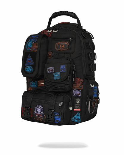 Sprayground - JAMES FIRST CLASS I GOT THESE STAMPS BACKPACK